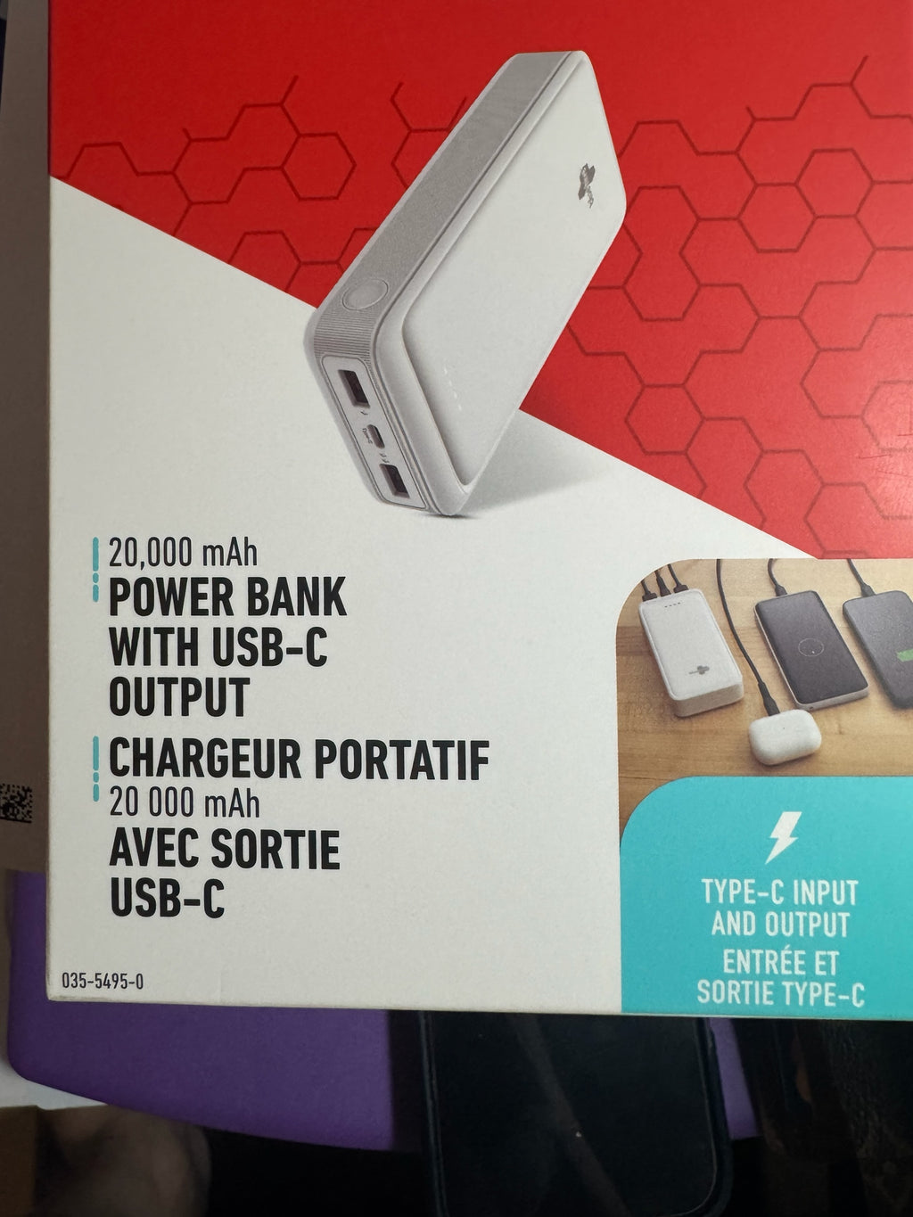 KMD MarketHub Blue Hive 20,000 mAh portable power bank in white with USB-C input and output ports on product packaging.