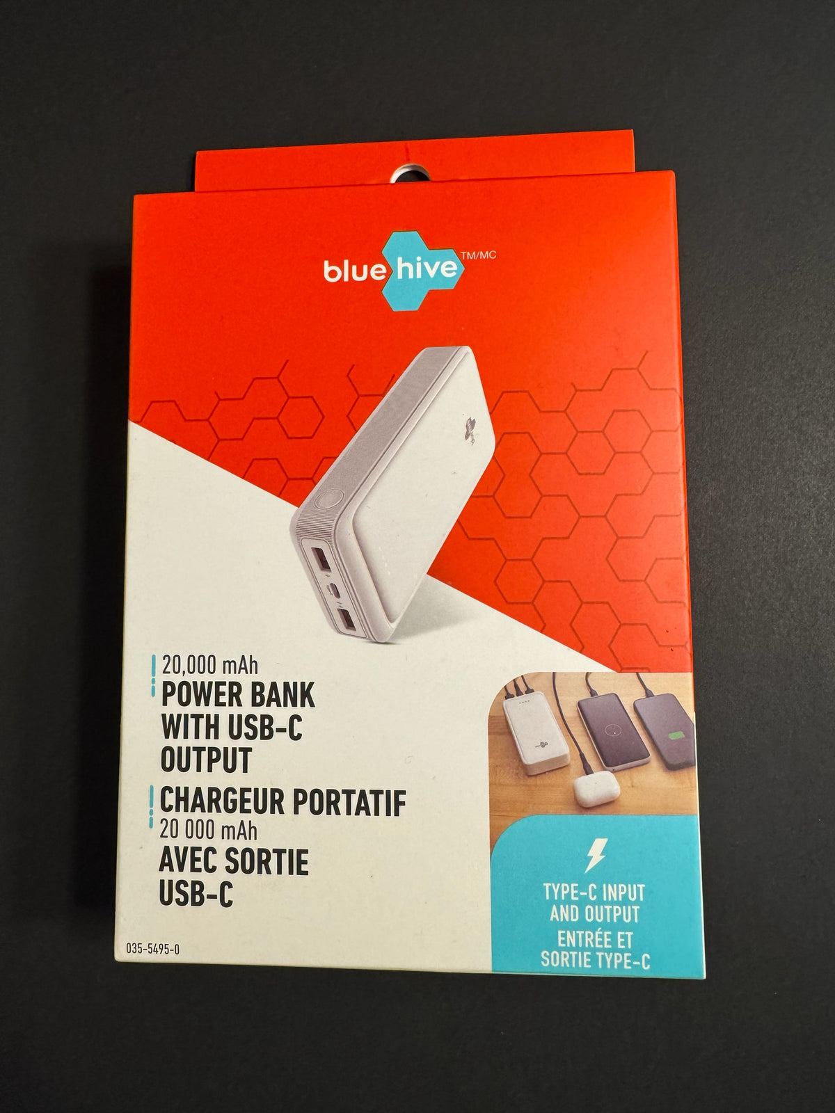 KMD MarketHub Blue Hive 20,000 mAh portable power bank in white packaging with USB-C input and output features.